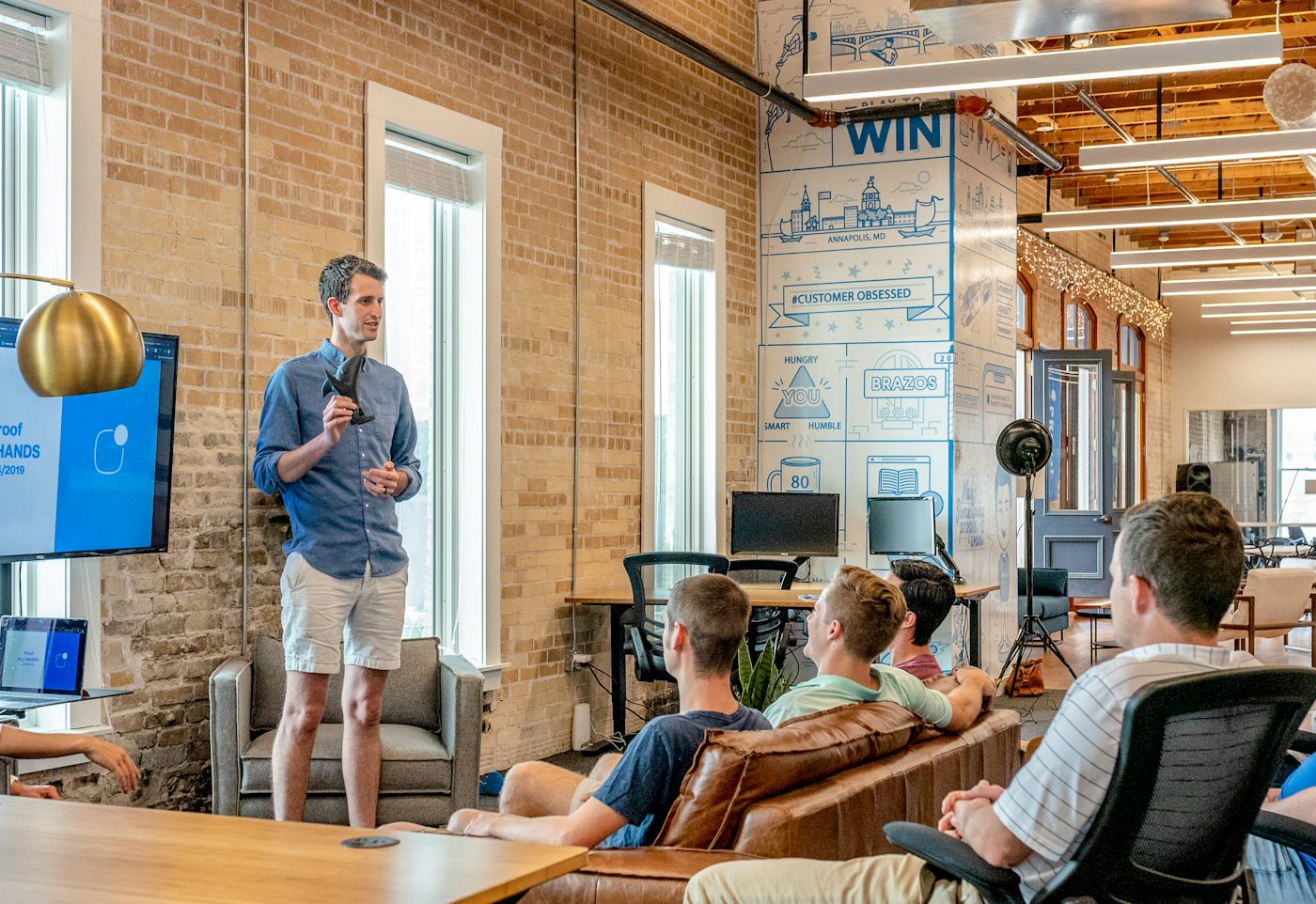 A product team working through a design workshop around a table